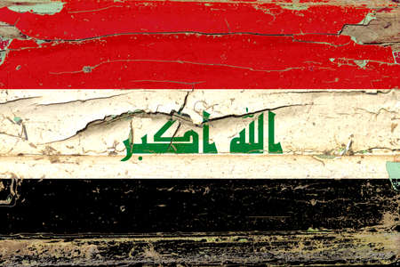 3D Flag of Iraq on a old wood wall background.