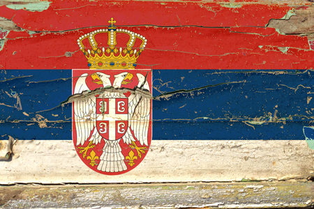 3D Flag of Serbia on a old wood wall background.の写真素材