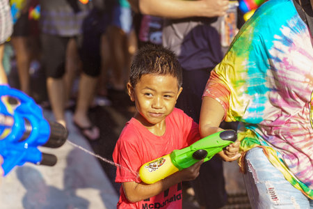 Siam Square, Bangkok, Thailand - APR 13, 2019: short action of people joins celebrations of the Thai New Year or Songkran in Siam Square.のeditorial素材