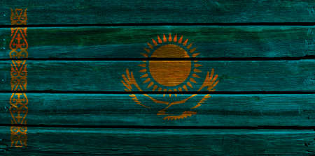 3D Flag of Kazakhstan on a old wood wall background.の写真素材
