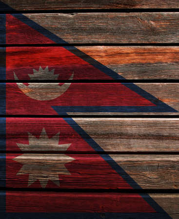 3D Flag of Nepal on a old wood wall background.の写真素材