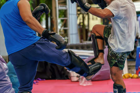 Sparring thai boxing in a boxing stadium.の写真素材