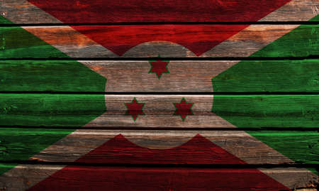 3D Flag of Burundi on a old wood wall background.の写真素材