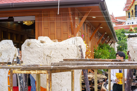 Nonthaburi, Thailand - AUG 17, 2019 - Pouring ceremony for Thonglor Buddha statues at Samian Nari Temple at Chatuchak, Bangkok, Thailand.のeditorial素材