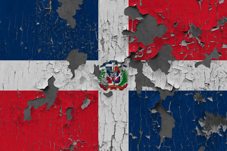 3D Flag of Dominican Republic on an old stone wall background.の写真素材