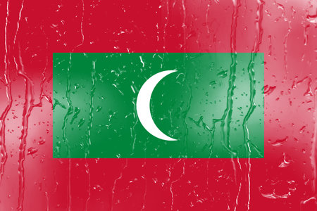 3D Flag of Maldives on a glass with water drop background.の写真素材