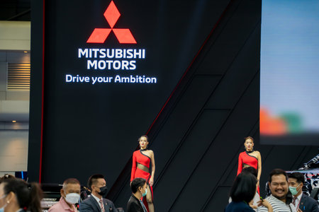 Nonthaburi, Thailand - APR 2, 2023 Unidentified model poses with a car at The 44th Bangkok international motor show 2023 at IMPACT Arena, Muang Thong Thani, Nonthaburi, Thailand.のeditorial素材