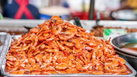 Pile of sweetened cooked small shrimp or Kung Wan at Thai street food market.の写真素材