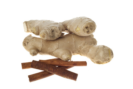 Ginger and cinnamon sticks   isolated on white background