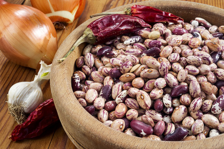 haricot beans in a wooden bowl