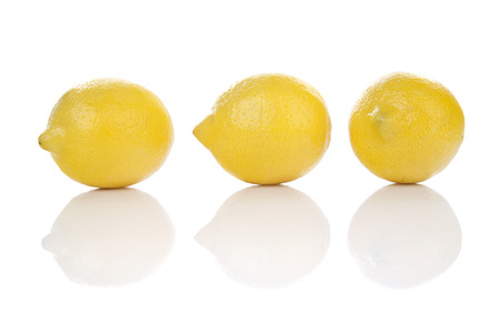 Fresh lemons, isolated on white backgroundの写真素材