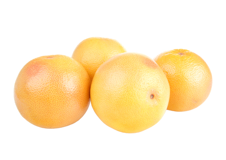 Fresh grapefruits, isolated on white backgroundの写真素材