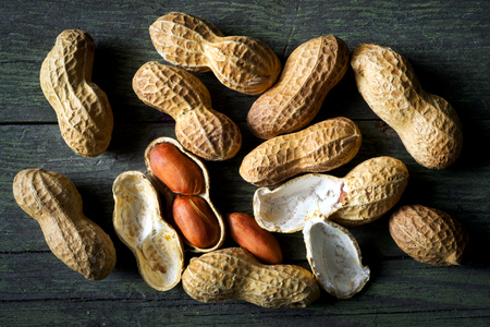 peanuts  on wooden tableの写真素材