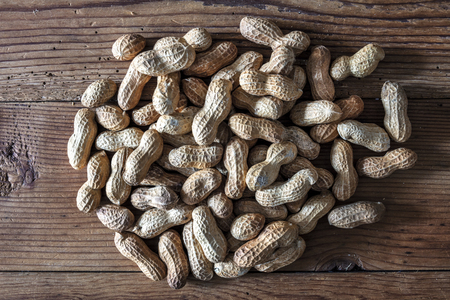 peanuts  on wooden tableの写真素材