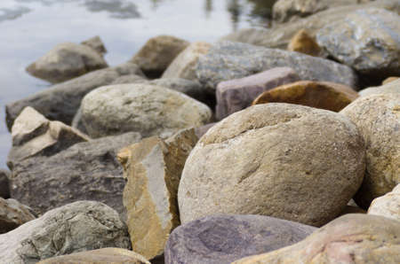 Round rocks along a beach