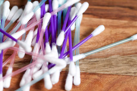 cotton swabs on wooden backgroundの写真素材