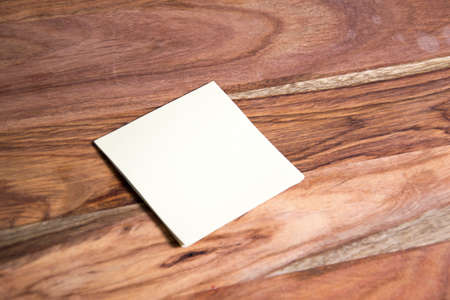 Post-it on wooden background
