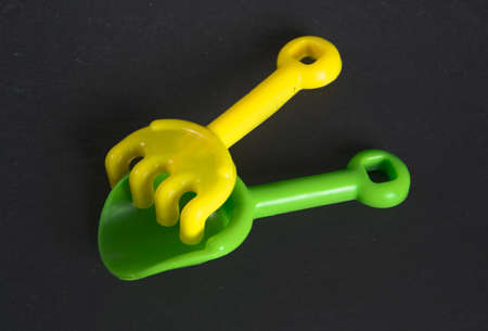 beach toys  on black backgroundの写真素材