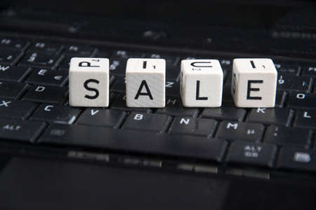 the word sale on a keyboardの写真素材