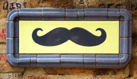 a sign with a mustacheの写真素材