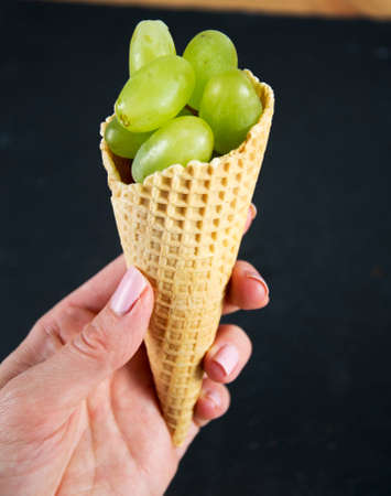 ice-cream wafer with grapesの写真素材