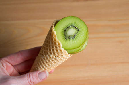 ice cream waffer with kiwiの写真素材