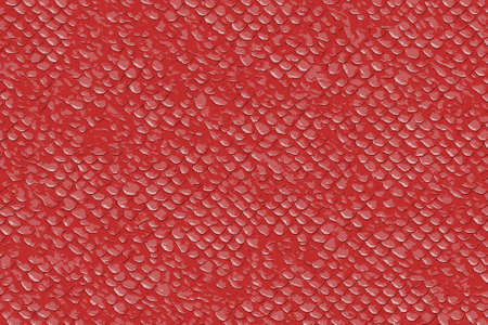 Red fish or lezard scales for a seamless textured backgroundの写真素材