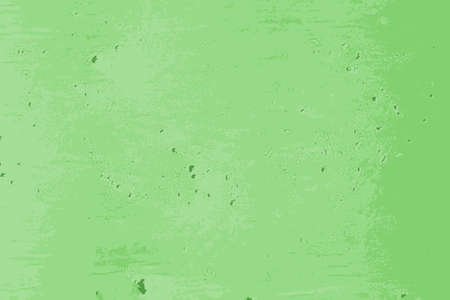 Green pocked texture of a cement wall in the street