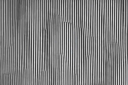 Gray corrugated abstract metallic background with metal texturesの写真素材