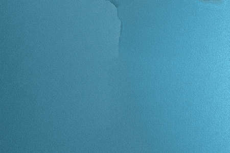 Blue wall texture with a crack in the middleの写真素材