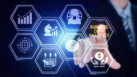 Business Data Analysis Concept
Hexagonal virtual Touch Screen Concept with man touching screen with finger and light streakの写真素材