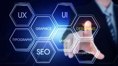 Web Designing
Hexagonal virtual Touch Screen Concept with man touching screen with finger and light streakの写真素材