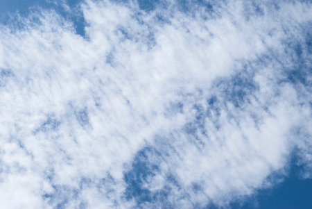 gentle clouds in the blue sky