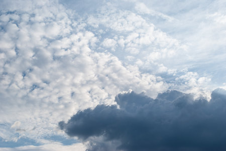 white clouds in a soft blue sky