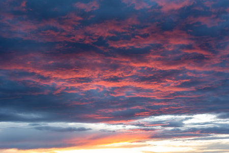 Colorful dramatic sky with cloud at sunset. Sky background. Cloudscape.