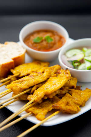 Grilled Pork Satay with Peanut Sauce and Vinegarの写真素材