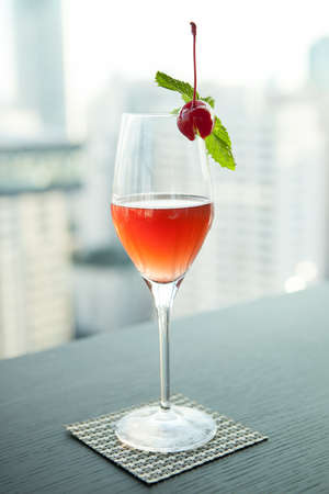Glass of cherry Cocktail の写真素材