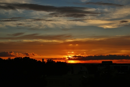 beautiful sunset in red, blue and orange colorsの写真素材