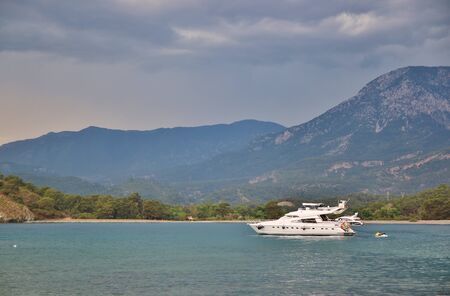 Motor boat on the beach next to Kemer, Turkeyの写真素材