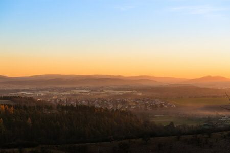 Beautiful autumn morning on the view point above the deep forest in Czech Republic, Europe
