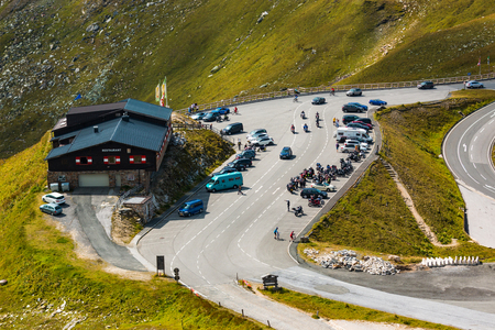 ALPS, AUSTRIA - 27.08.2017: Tourists at the mountain restaurant on the Grossglockner high alpine road in Austriaのeditorial素材