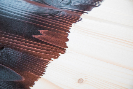 Half painted wooden boardの写真素材