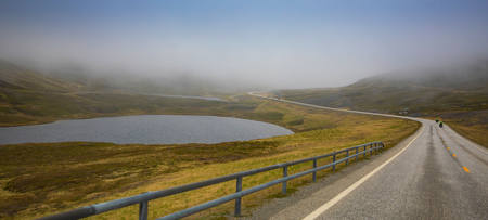 Beautiful road to Nordkapp in fog, the northern part of Norwayの写真素材