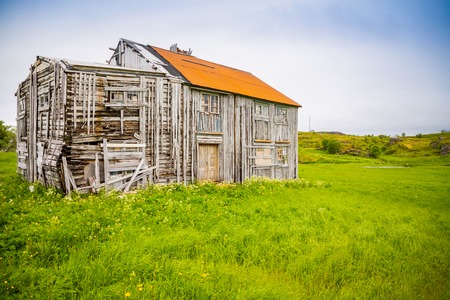 Old abandoned wooden house at Fredvang in Lofoten, Norwayの写真素材