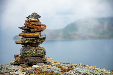 Pyramid Of Rocks Stones on mountain background, Norwayの写真素材