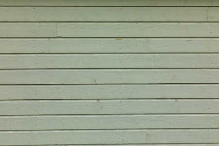 Green rural wooden wall, background photo textureの写真素材