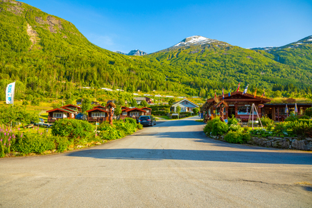 Stryn, Norway - 25.06.2018: Red camping cabins for travelers in Strynsvatn Camping in Norwayのeditorial素材