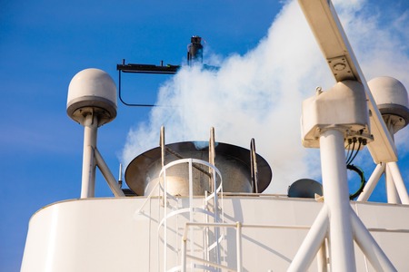 Elements of white ferry and blue sky, Norway