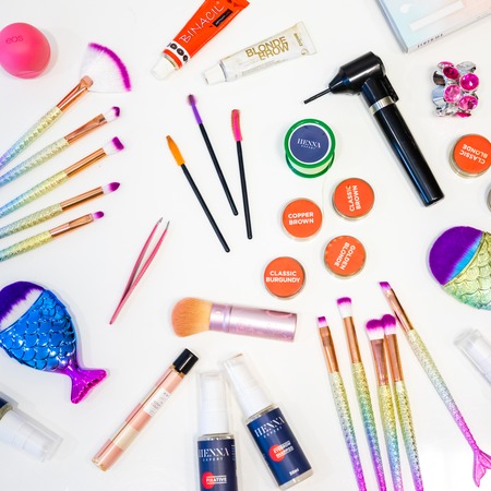 Prague, Czech Republic - 5.08.2018: Professional makeup tools and brushes. Flat composition. magazines and social media. Top view. Flat lay.のeditorial素材