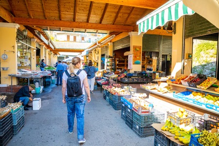 Corfu, Greece - 16.10.2018: Traditional street market in Corfu town, local people shopping in Greeceのeditorial素材